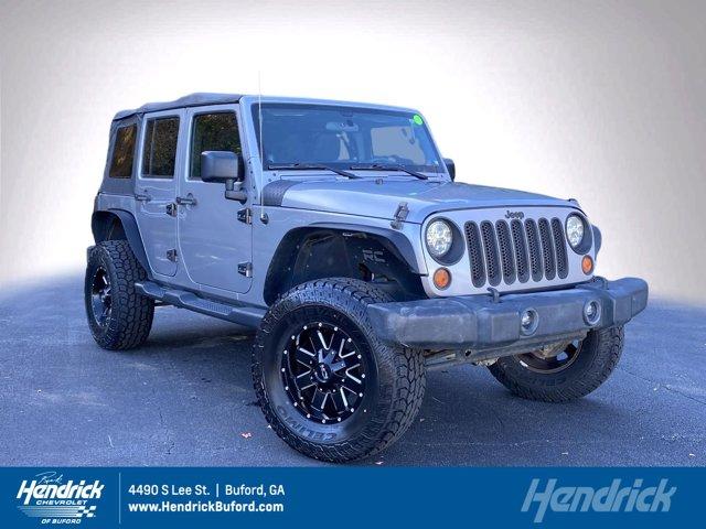 used 2013 Jeep Wrangler Unlimited car, priced at $16,910