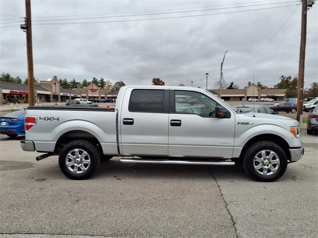 used 2013 Ford F-150 car, priced at $14,000