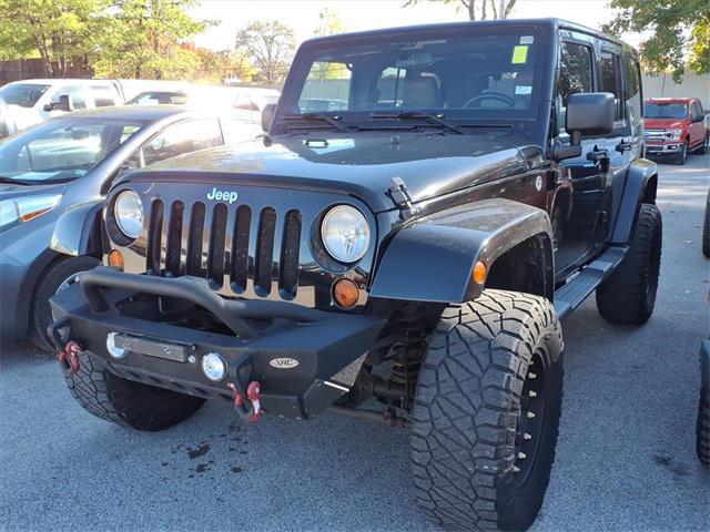 used 2011 Jeep Wrangler Unlimited car, priced at $14,232