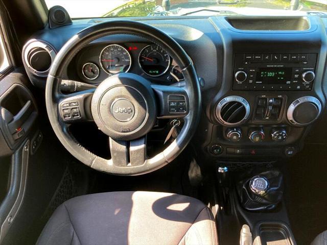 used 2013 Jeep Wrangler Unlimited car, priced at $14,990