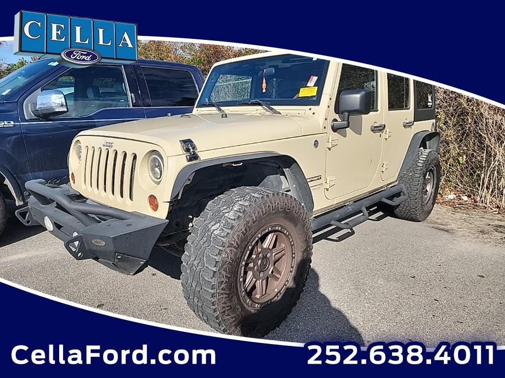 used 2011 Jeep Wrangler Unlimited car, priced at $12,988