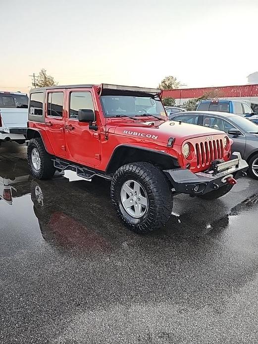 used 2012 Jeep Wrangler Unlimited car, priced at $16,658