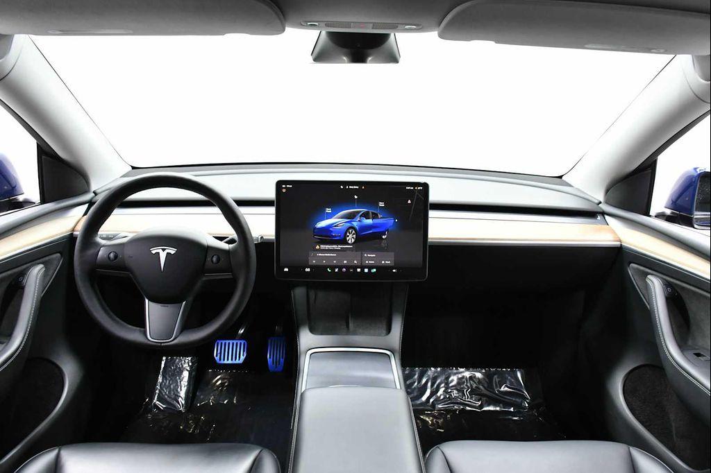 used 2023 Tesla Model Y car, priced at $28,500
