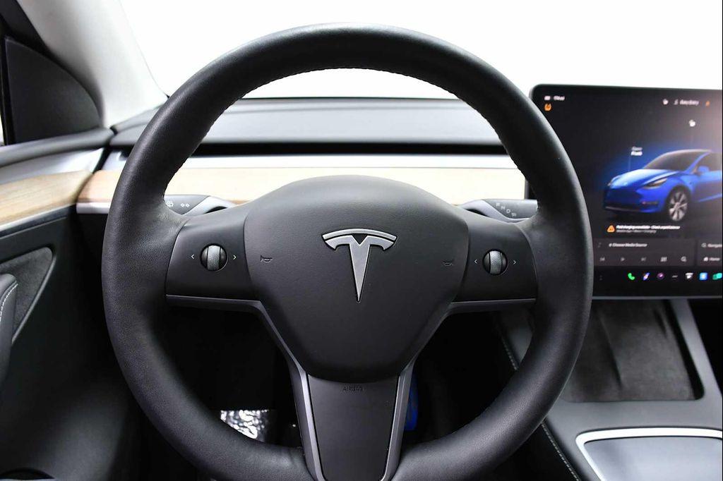 used 2023 Tesla Model Y car, priced at $28,500