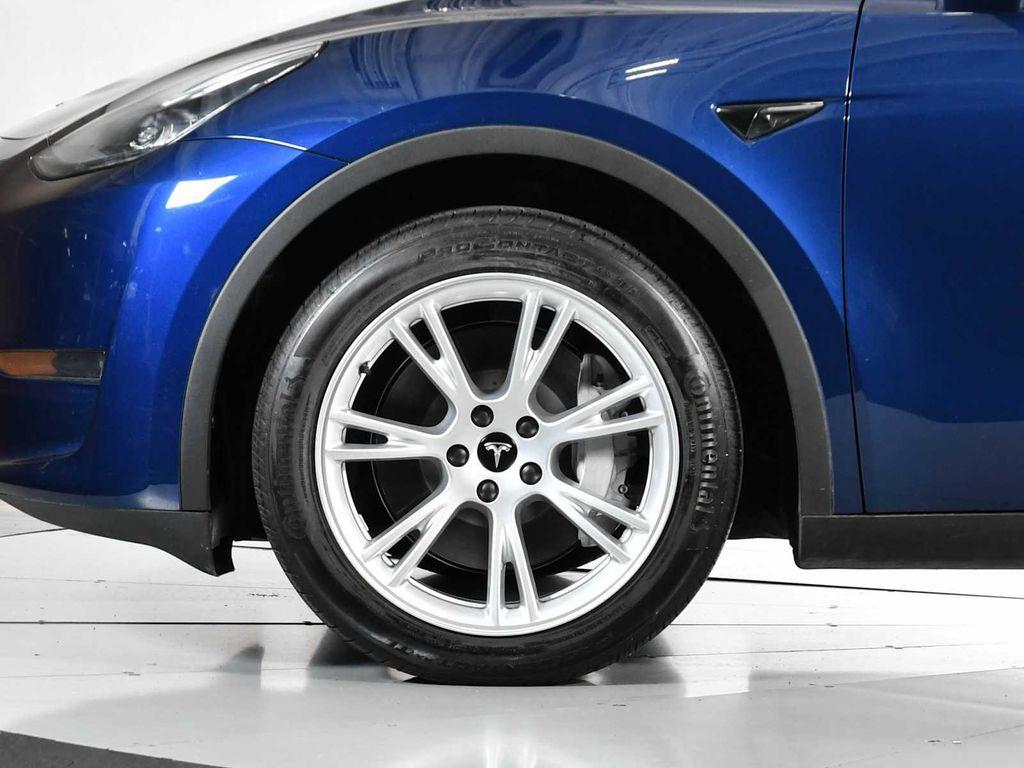 used 2023 Tesla Model Y car, priced at $28,500