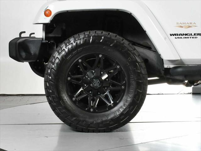 used 2013 Jeep Wrangler Unlimited car, priced at $18,888