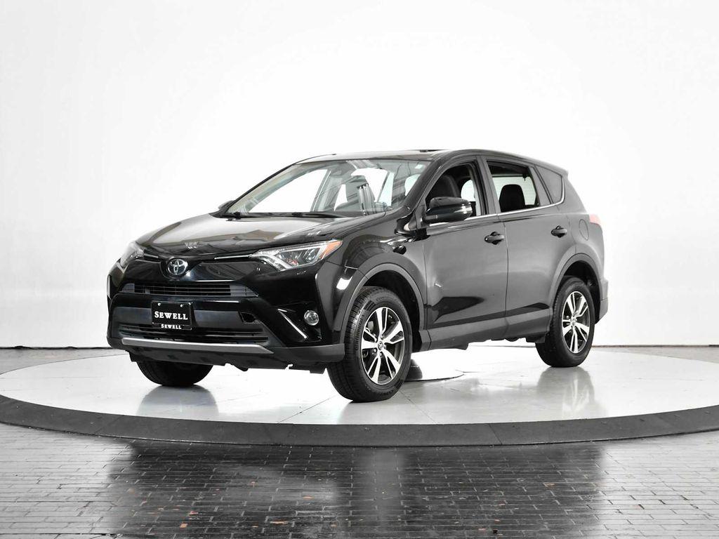 used 2018 Toyota RAV4 car, priced at $19,998