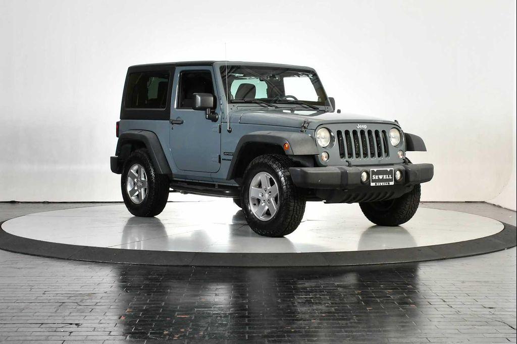 used 2014 Jeep Wrangler car, priced at $13,998