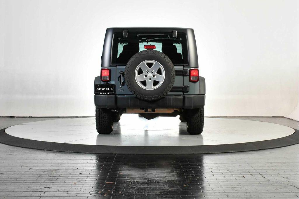 used 2014 Jeep Wrangler car, priced at $13,998