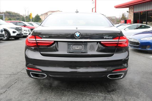 used 2016 BMW 750 car, priced at $26,900