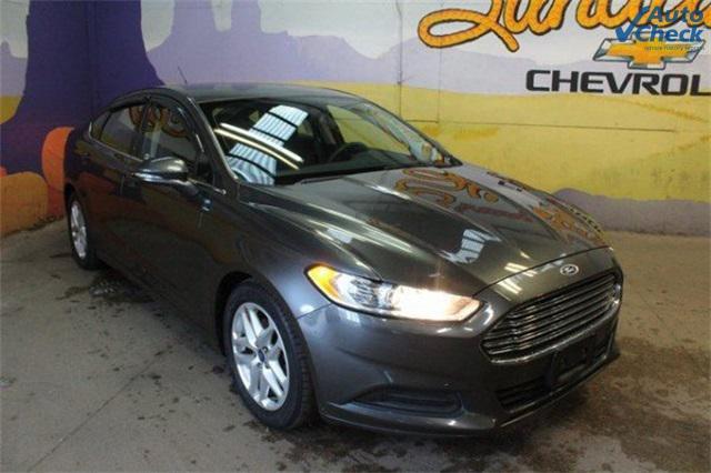 used 2016 Ford Fusion car, priced at $12,900