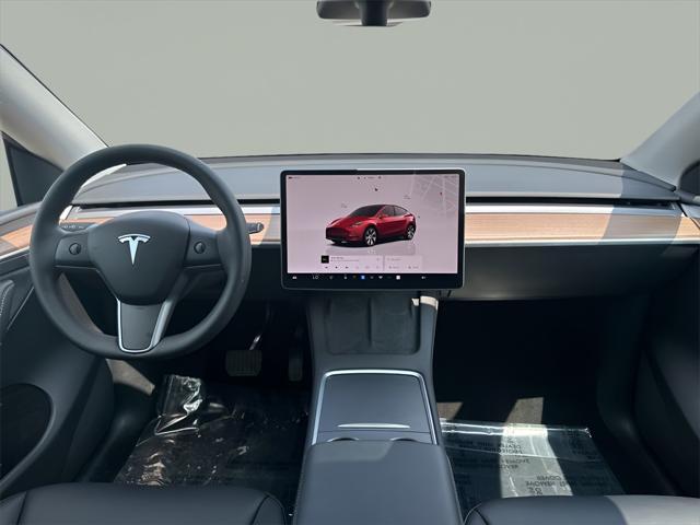 used 2023 Tesla Model Y car, priced at $37,295