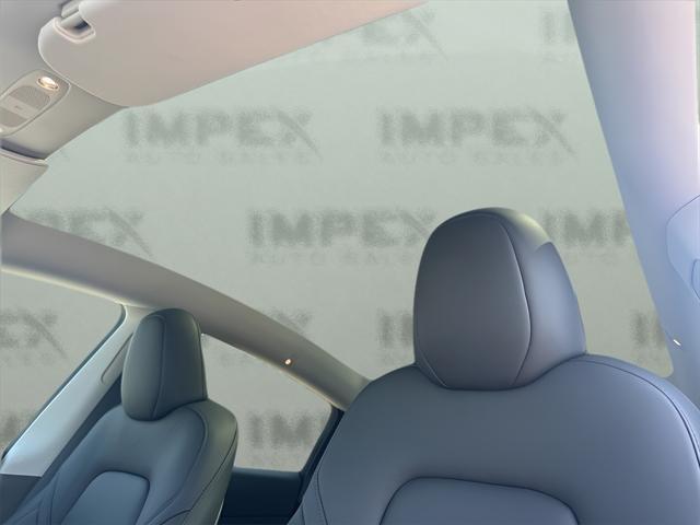 used 2024 Tesla Model Y car, priced at $41,650