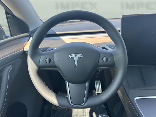 used 2024 Tesla Model Y car, priced at $41,650