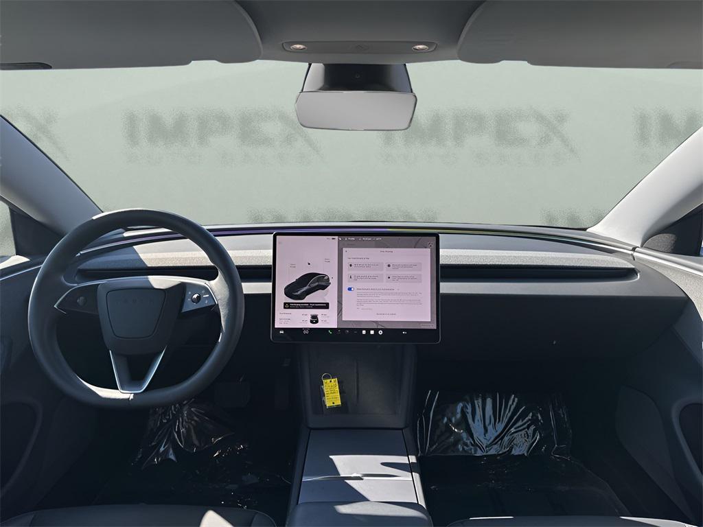 used 2025 Tesla Model 3 car, priced at $36,750