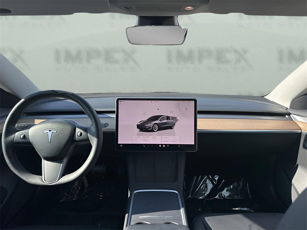 used 2023 Tesla Model 3 car, priced at $26,210
