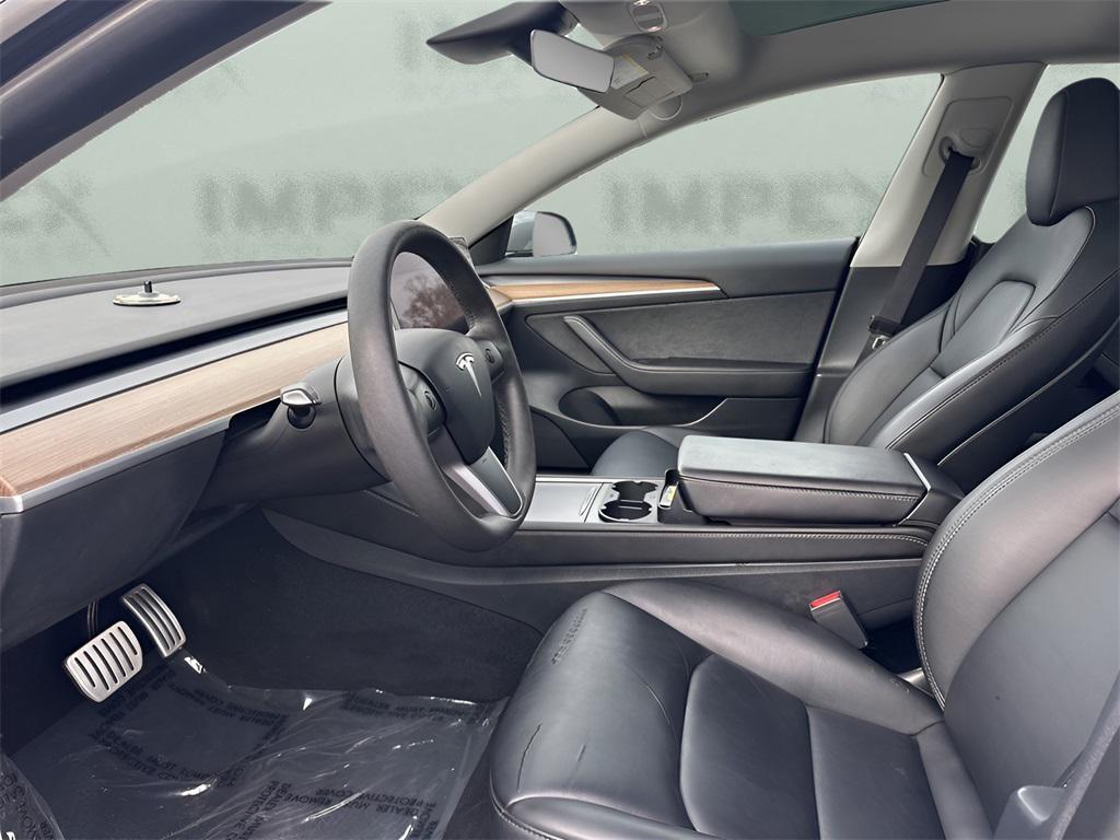 used 2023 Tesla Model 3 car, priced at $28,550
