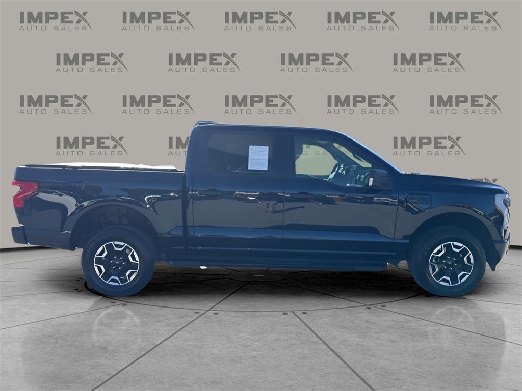 used 2023 Ford F-150 Lightning car, priced at $36,450