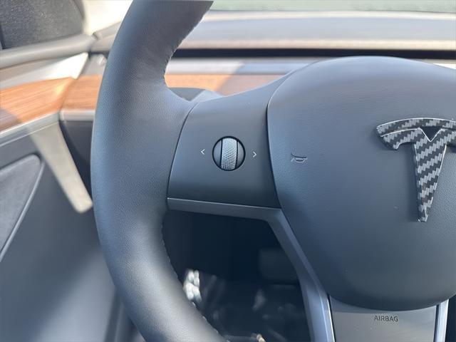 used 2024 Tesla Model Y car, priced at $35,950