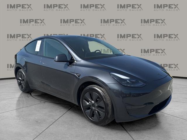 used 2024 Tesla Model Y car, priced at $35,950
