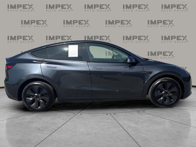used 2024 Tesla Model Y car, priced at $35,950
