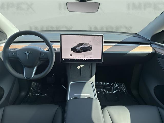 used 2024 Tesla Model Y car, priced at $35,950