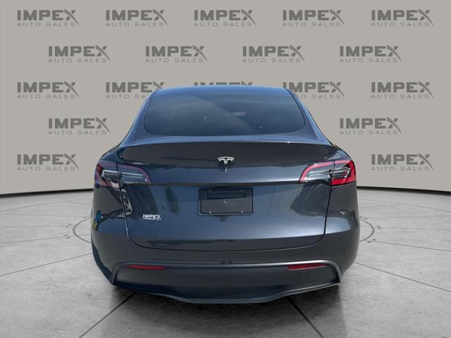 used 2024 Tesla Model Y car, priced at $35,950