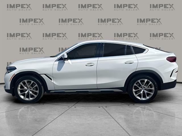 used 2023 BMW X6 car, priced at $47,890