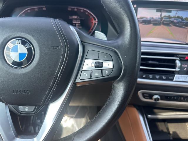 used 2023 BMW X6 car, priced at $47,890