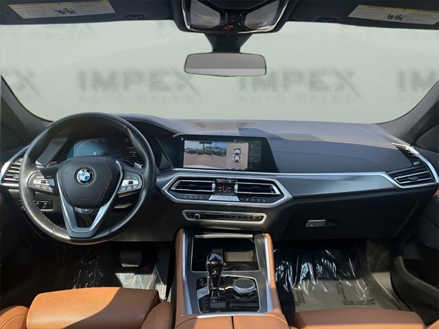 used 2023 BMW X6 car, priced at $47,890
