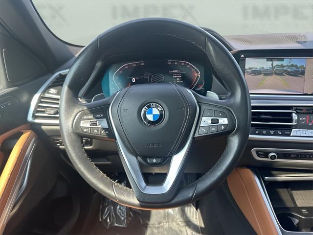 used 2023 BMW X6 car, priced at $47,890