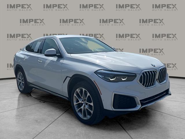 used 2023 BMW X6 car, priced at $47,890