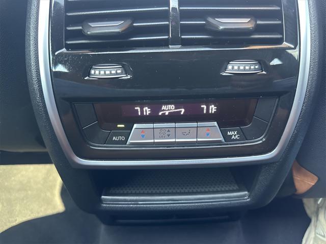 used 2023 BMW X6 car, priced at $47,890