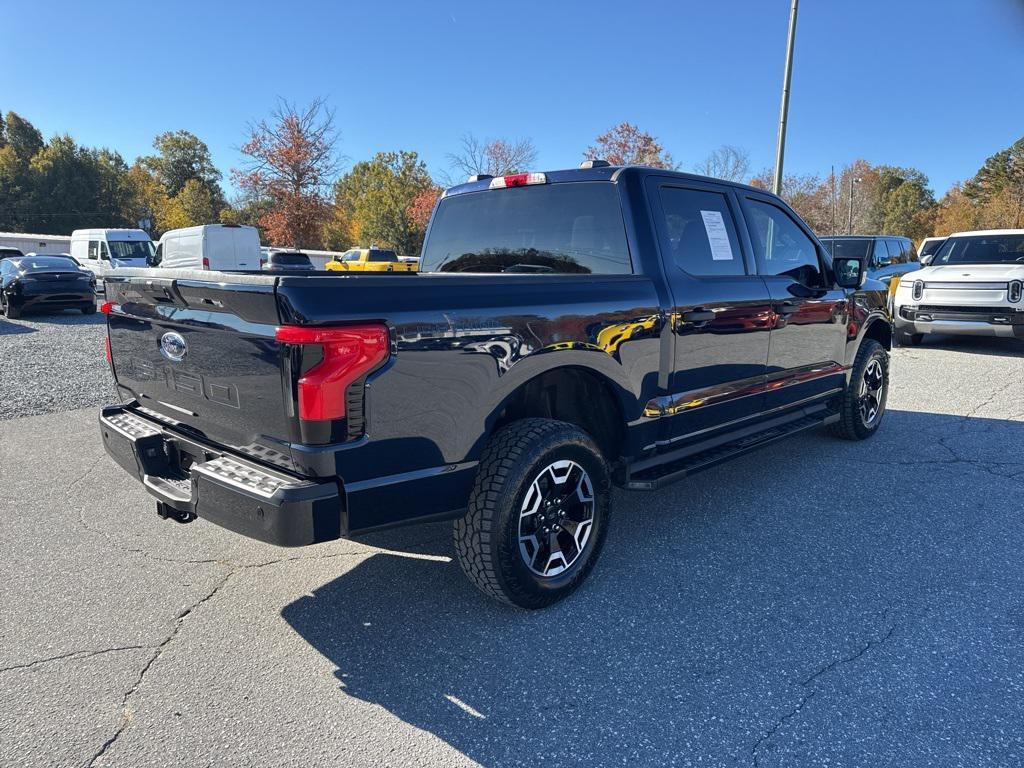 used 2022 Ford F-150 Lightning car, priced at $31,500