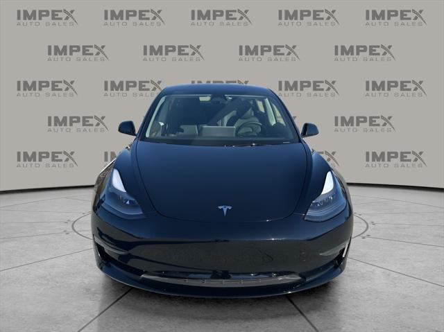 used 2023 Tesla Model 3 car, priced at $33,980