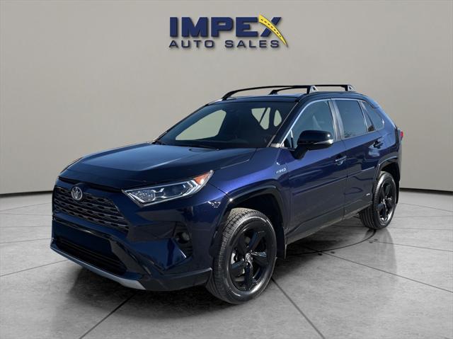 used 2021 Toyota RAV4 Hybrid car, priced at $28,180