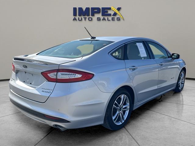 used 2016 Ford Fusion Hybrid car, priced at $10,900