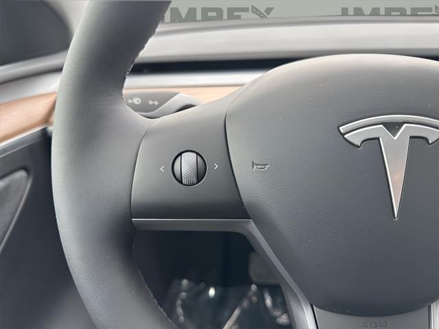 used 2025 Tesla Model Y car, priced at $42,500