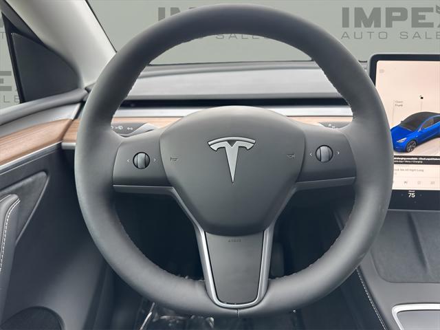 used 2025 Tesla Model Y car, priced at $42,500