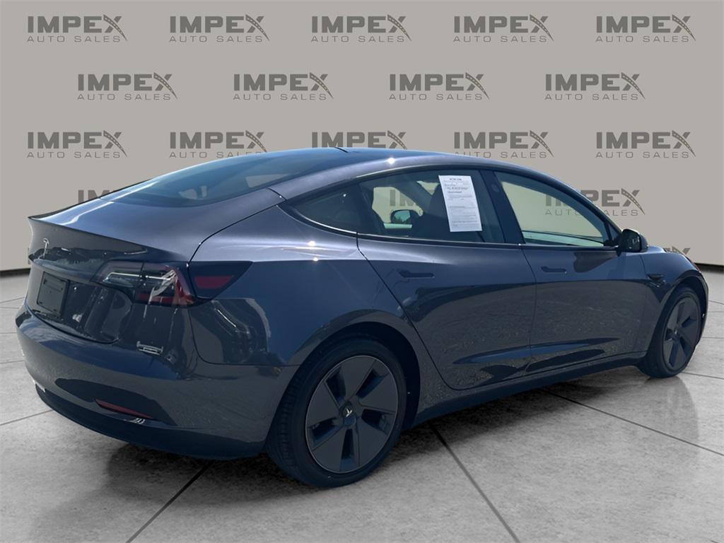 used 2023 Tesla Model 3 car, priced at $27,500
