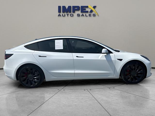 used 2022 Tesla Model 3 car, priced at $34,995