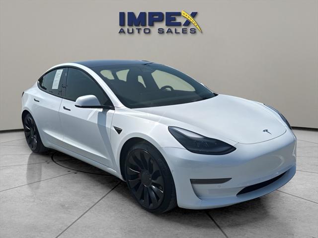 used 2022 Tesla Model 3 car, priced at $34,995