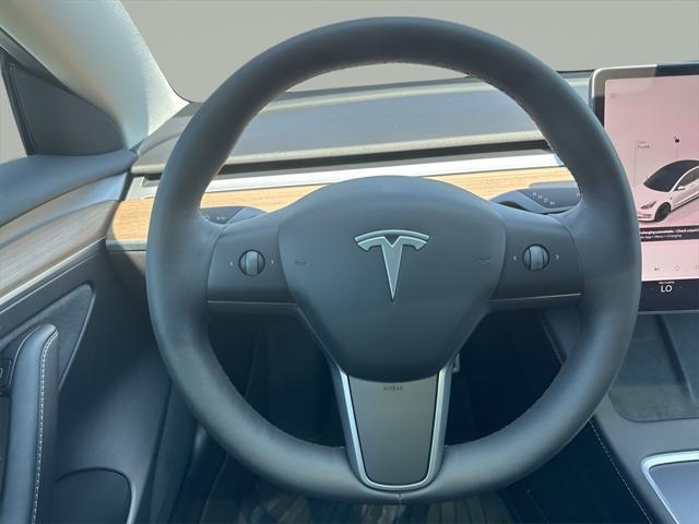 used 2022 Tesla Model 3 car, priced at $34,995