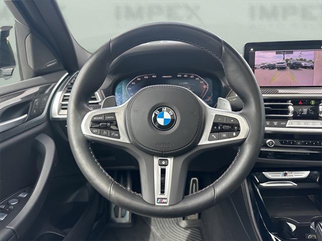 used 2023 BMW X4 car, priced at $57,650