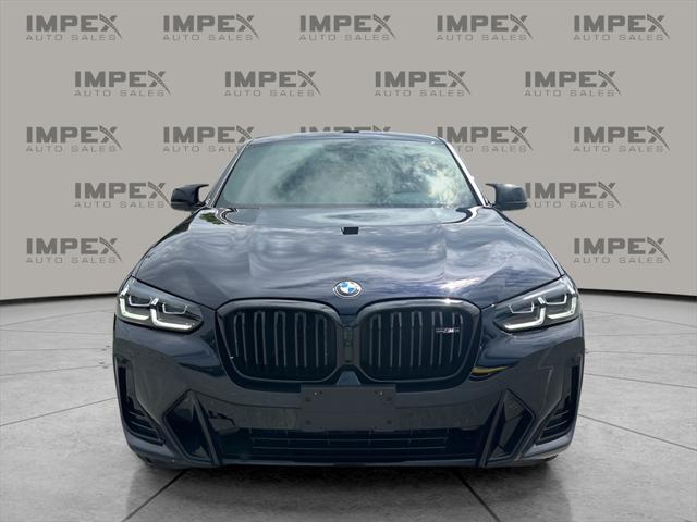 used 2023 BMW X4 car, priced at $57,650