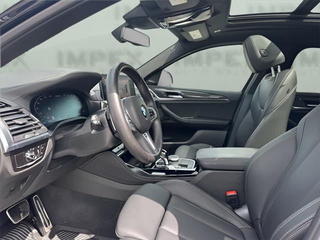 used 2023 BMW X4 car, priced at $57,650