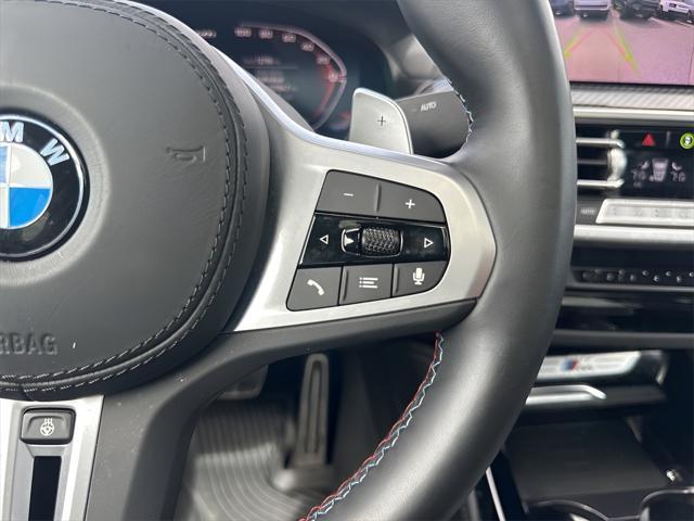used 2023 BMW X4 car, priced at $57,650