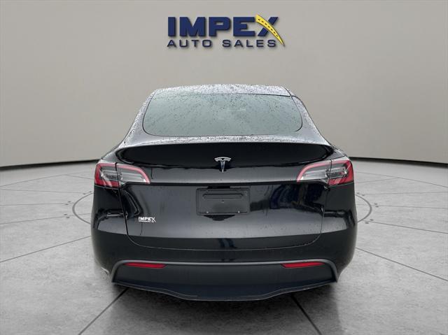 used 2024 Tesla Model Y car, priced at $36,360