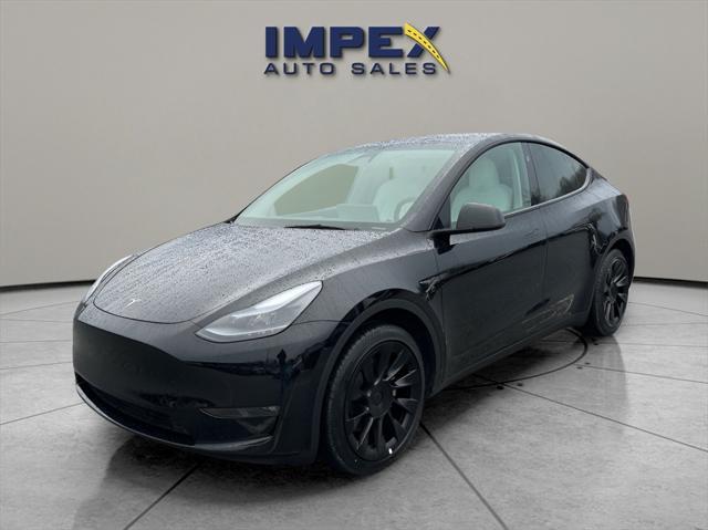 used 2024 Tesla Model Y car, priced at $36,360