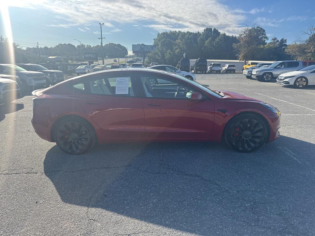 used 2022 Tesla Model 3 car, priced at $28,750